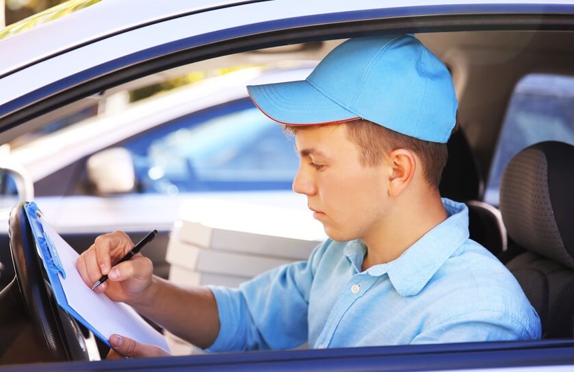 food delivery driver in car working for uber eats insurance