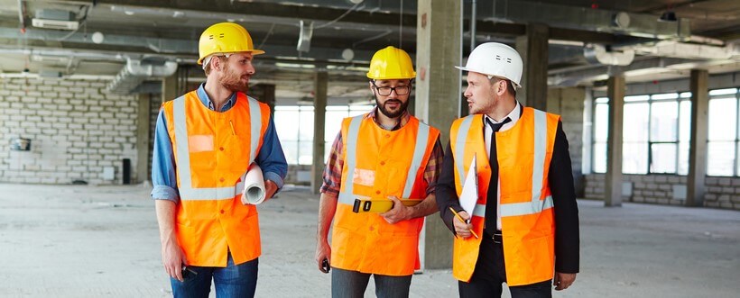 financial guarantee insurance group of contractors in construction site with bond insurance