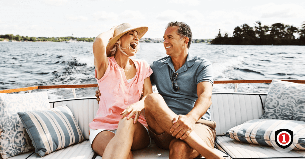 A couple having fun on their boat while the boat is covered by boat insurance