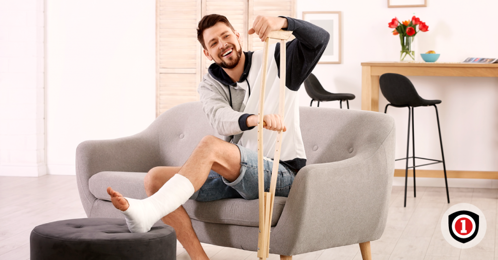 Caucasian men using crutches while having Disability Insurance 