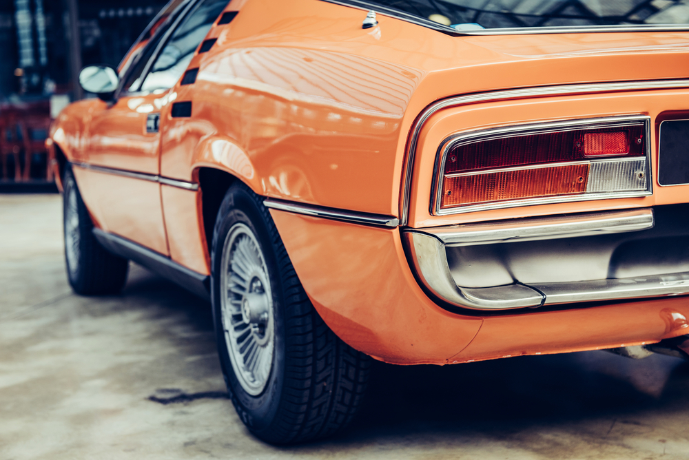 rear view of a orange classic car