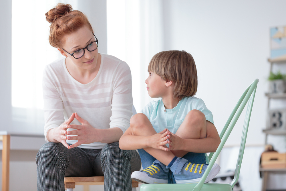 young mom talking with child