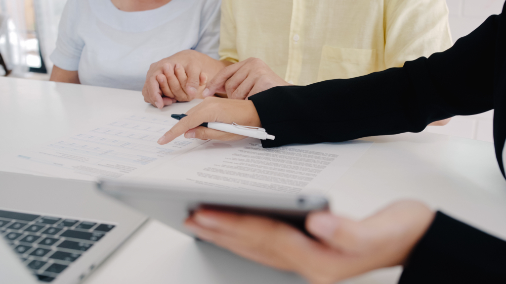 insurance agent going over options with customer