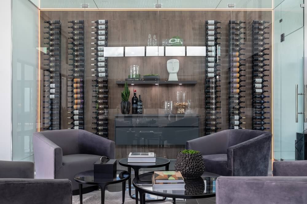Wine cabinet, cellar or shelve, in the living room of a luxurious home decorated with art, how to insure expensive items.