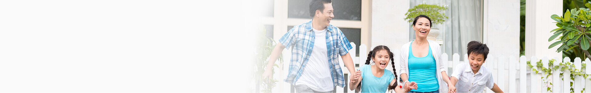 Happy asian family with smiling parents and two children