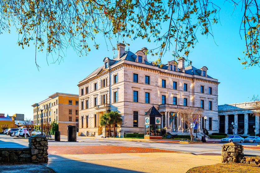 Pensacola City skyline, downtown street, and architectural landmarks, the winter landscape of the historic buildings of Escambia County Courthouse - best home insurance in Florida.