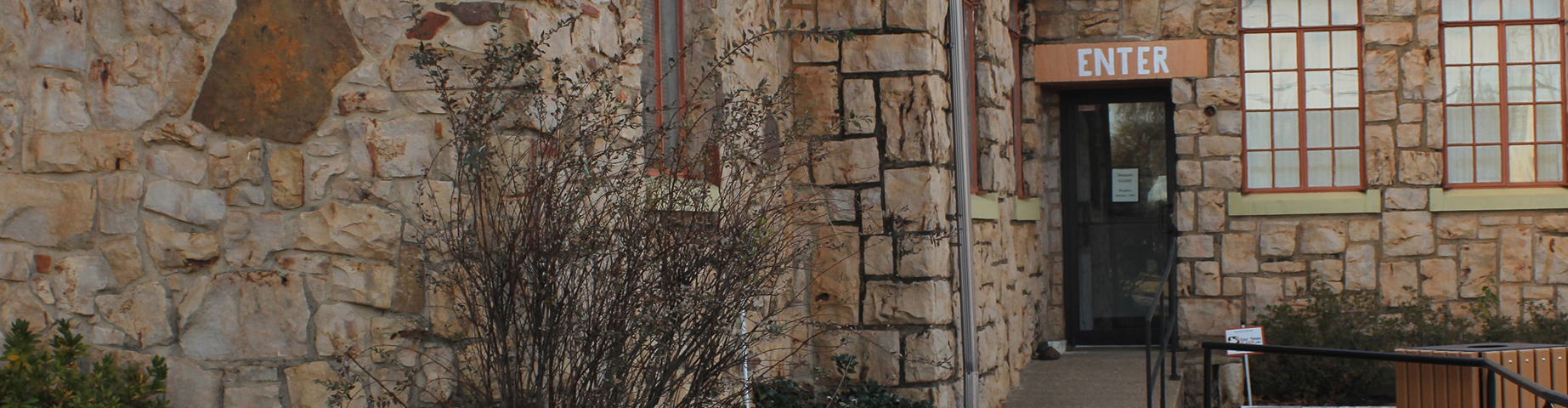 Close up of Historic Building Rock Wall Downtown Jacksonville - best homeowners insurance in Texas.