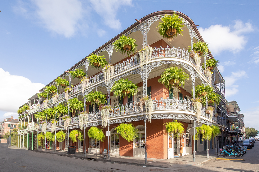 Old french building with typical iron balconies in the french quarter in New Orleans - best home insurance in Louisiana.