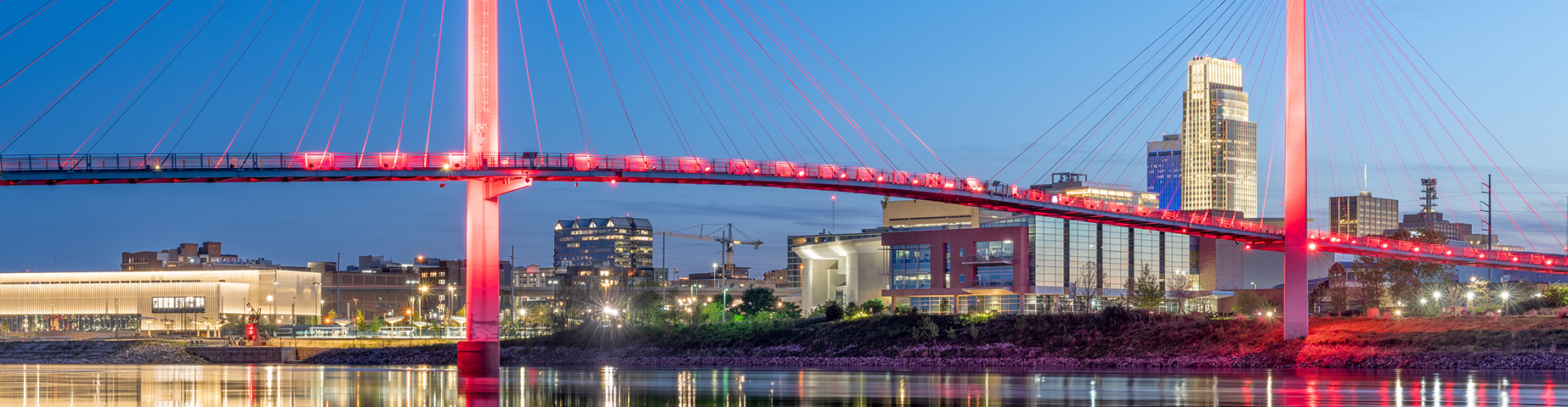 Omaha Skyline on the Missouri River at dusk - best home insurance in Nebraska.