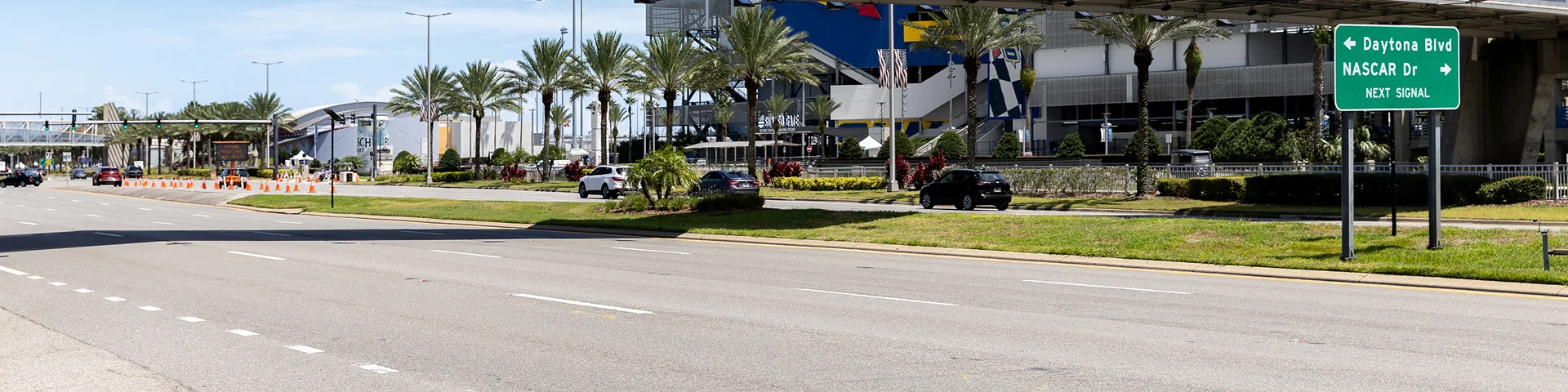 Daytona Beach, FL, USA - August 24, 2024: The Welcome to Daytona Beach sign located outside of the Daytona International Speedway on a pedestrian walkway bridge.