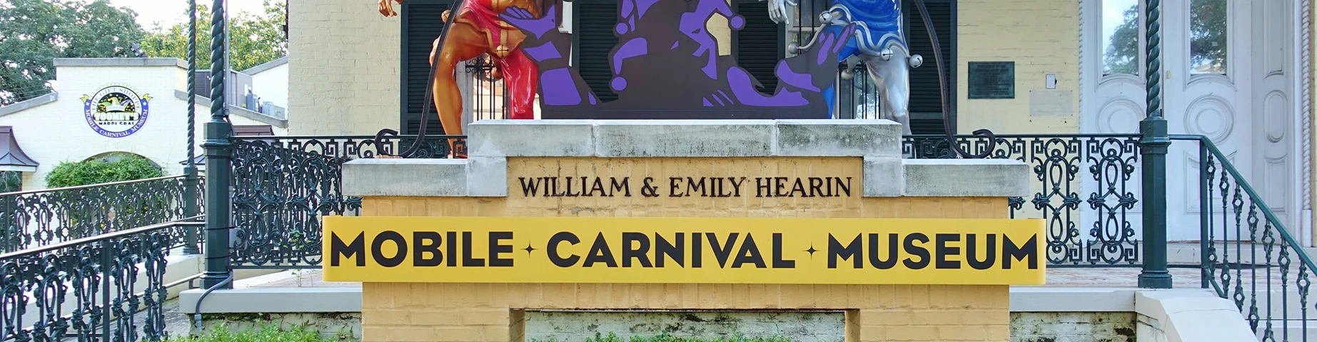 View of the Mobile Carnival Museum, located in the historic Bernstein-Bush mansion on Government Street in downtown Mobile - best homeowners insurance in Texas.