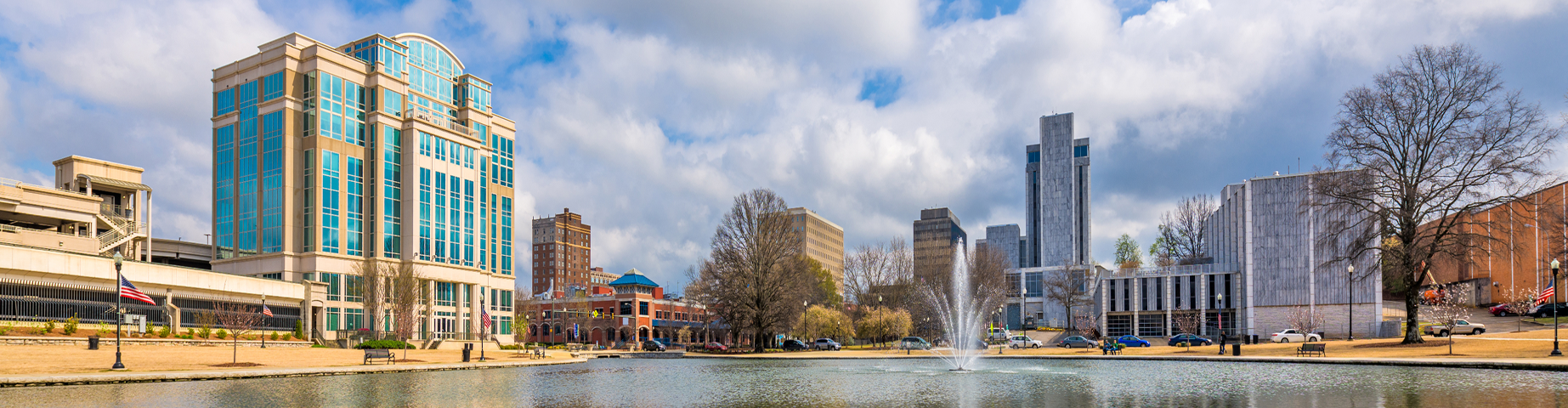 Huntsville park and downtown cityscape – best car insurance in Alabama.