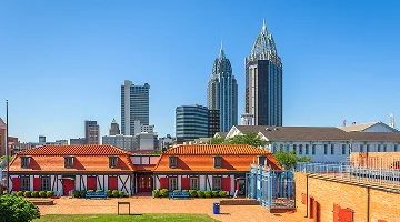 Mobile, Alabama, USA skyline with historic Fort Conde - best homeowners insurance in Texas.