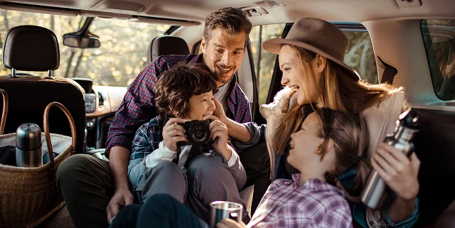 A family goes on a road trip, knowing they are protected with full coverage car insurance.