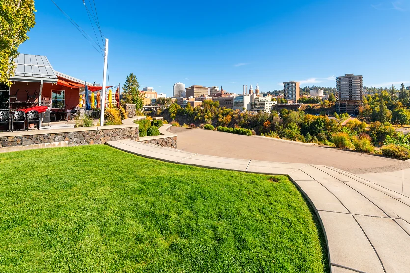 Views of downtown Spokane and the Spokane River from the newly developed Kendall Yards neighborhood of cafes, boutiques an art along the Centennial Trail. - best car insurance in Florida.