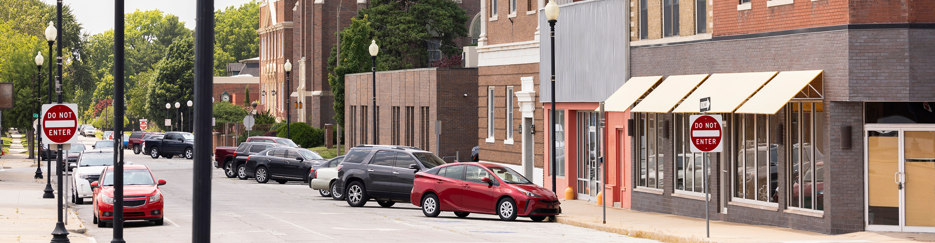 Afternoon sunlight shines on the historic core of downtown Independence.