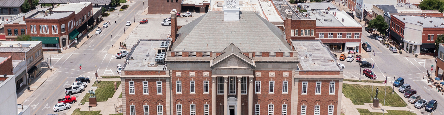 Independence, Missouri, USA - June 16, 2023: Afternoon sunlight shines on the historic core of downtown Independence.