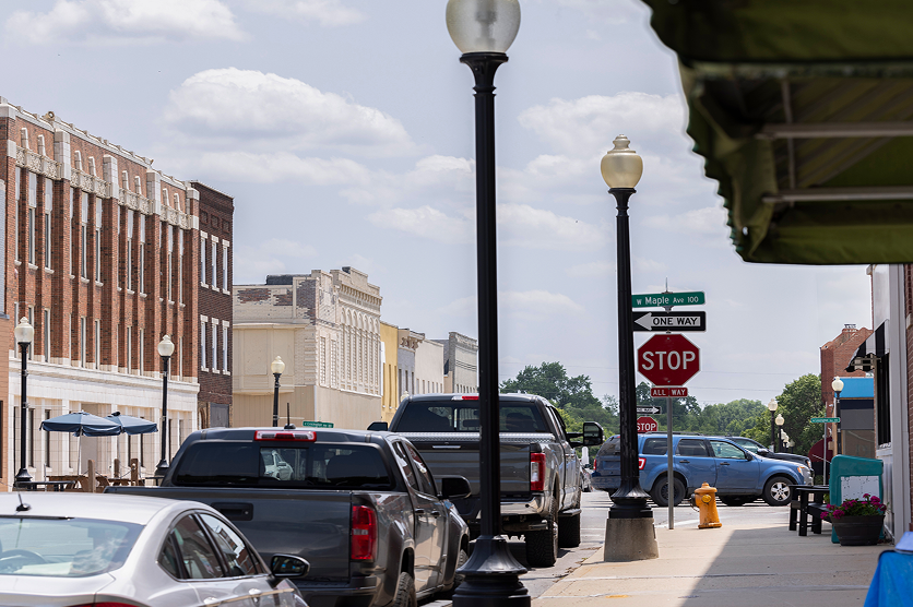 Independence, Missouri, USA - June 16, 2023: Afternoon sunlight shines on the historic core of downtown Independence.