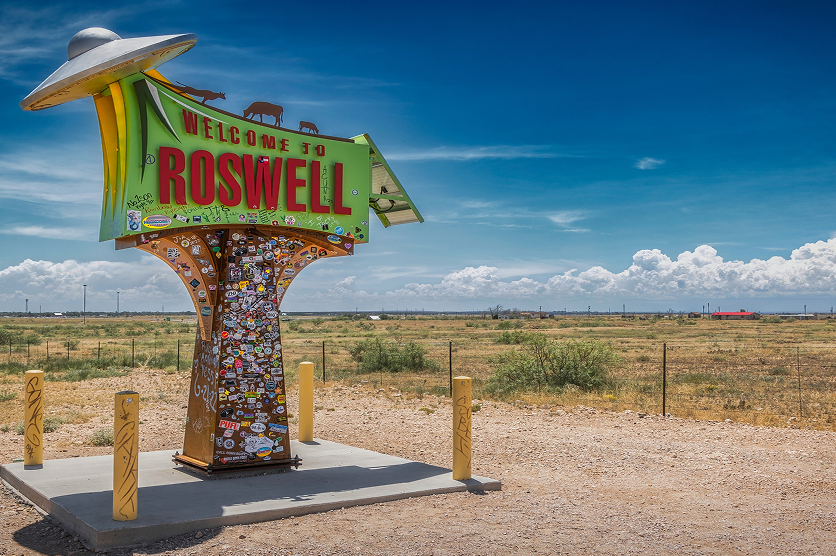The colorful sign, north of the city on highway 285, welcoming travelers to the city.