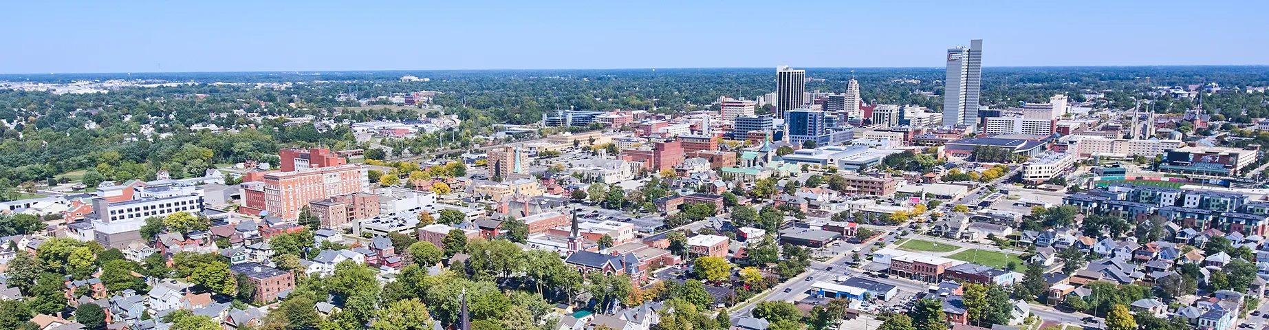 Aerial of Fort Wayne, Indiana with church in front and downtown in background