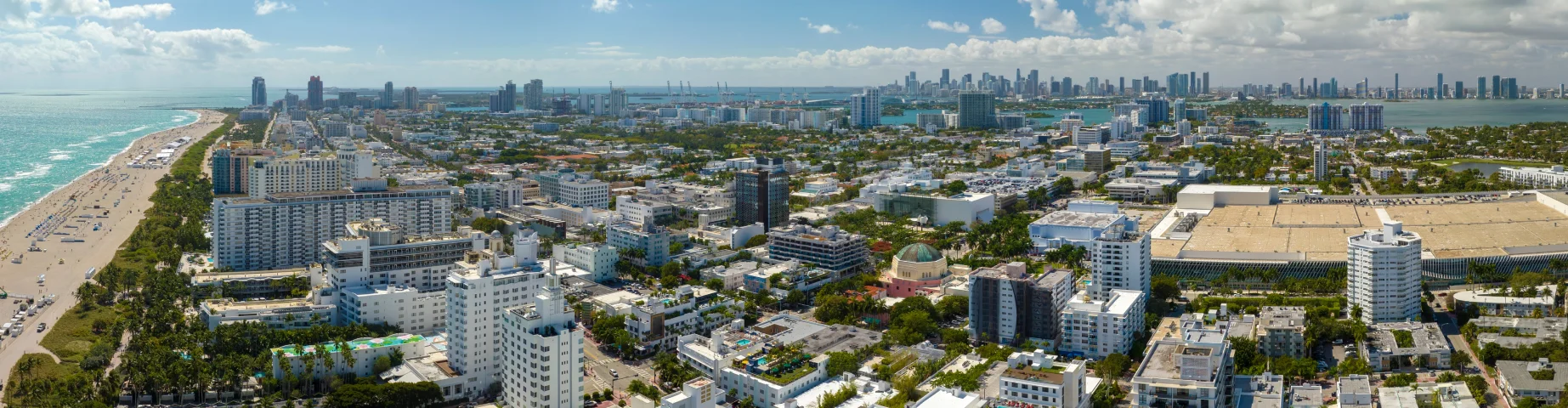 Aerial view of Miami Beach city with high luxury hotels and condos.